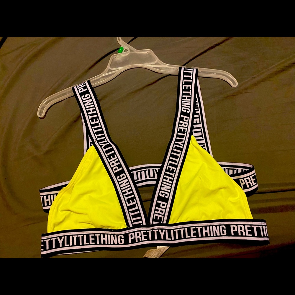 Pretty little thing neon yellow caged swim top/bralette.